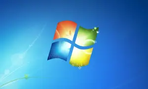 El logo de Windows 7 con un paisaje vibrante. Un recuerdo nostálgico para volver a Windows 7.