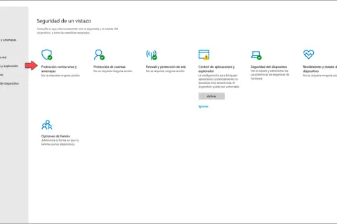 Pantalla de Seguridad de Windows. Se muestra la opción "Protección contra virus y amenazas" y la necesidad de atualizar antivirus.