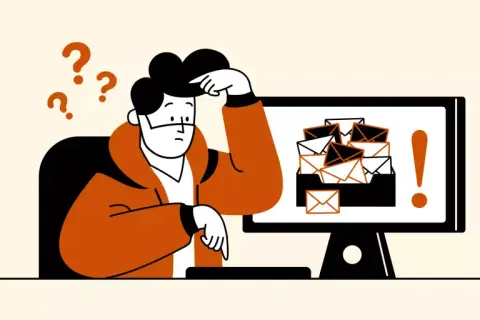 Hombre confundido frente a un monitor con muchos correos. Aprende cómo eliminar correos no deseados en Gmail y recupera tu tranquilidad.