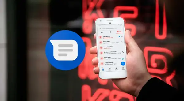 Móvil mostrando mensajes de texto, incluyendo "744 reportes de spam". La aplicación de mensajería Google Messages, que ayuda a filtrar por qué me llegan sms spam.