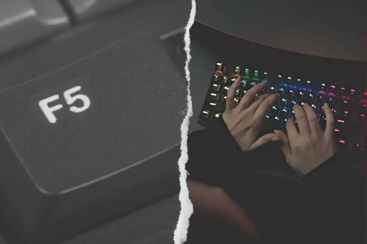 Teclado con tecla F5 destacada y manos escribiendo en un teclado RGB.