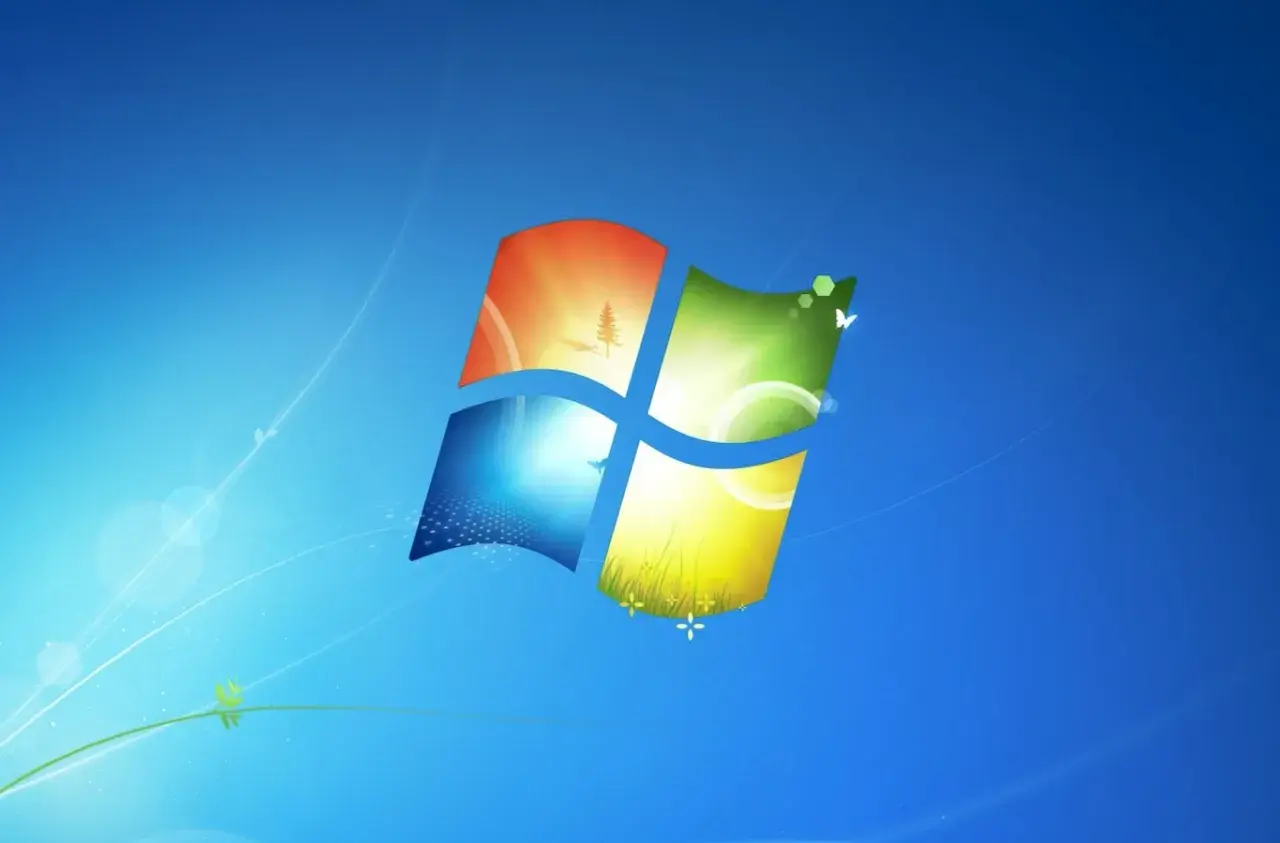 El logo de Windows 7 con un paisaje vibrante. Un recuerdo nostálgico para volver a Windows 7.