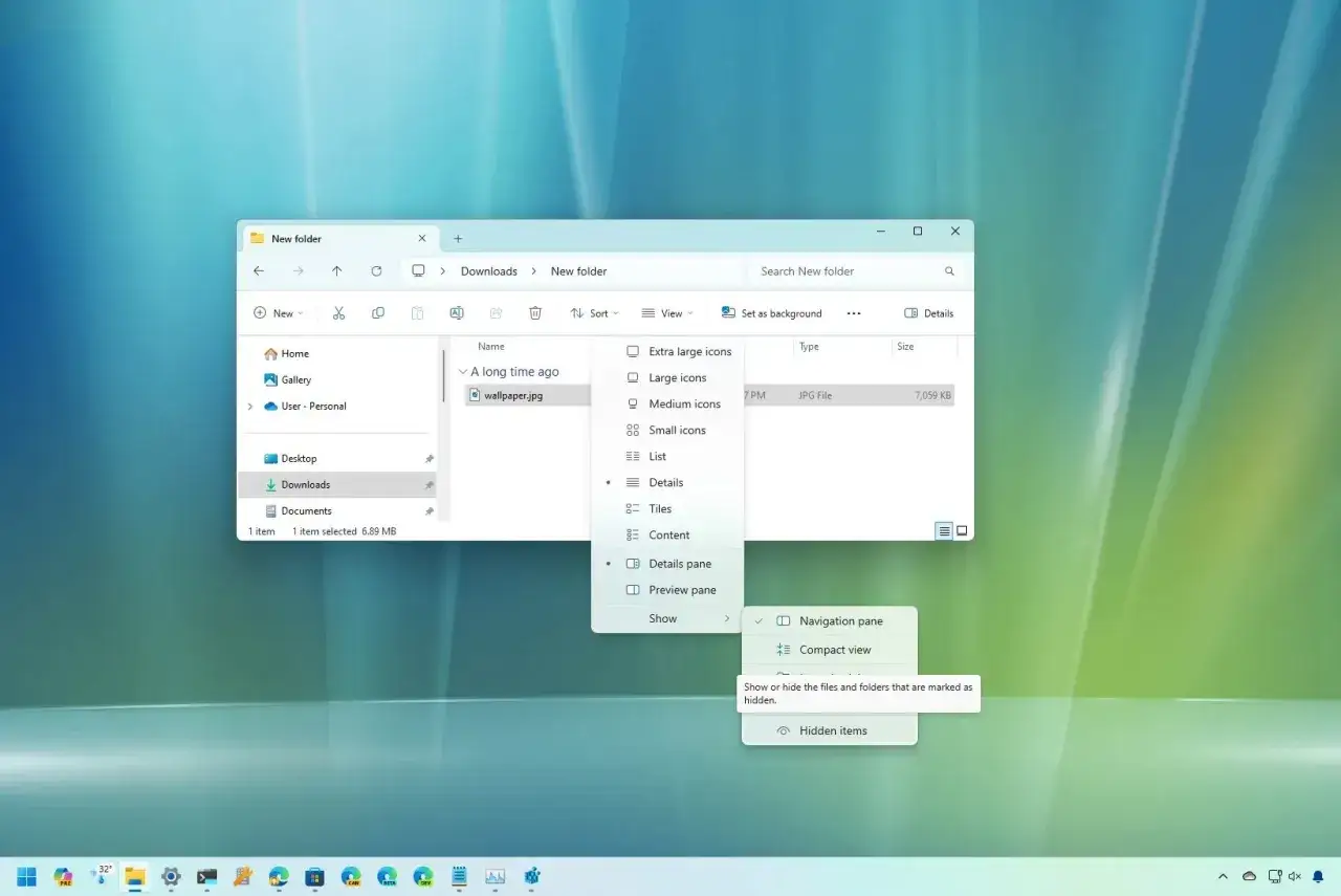 Ventana de Windows 11 mostrando cómo ver carpetas ocultas. El menú 