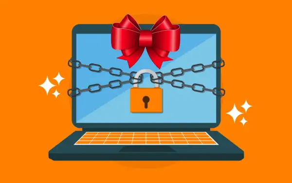 Un portátil con cadenas y un candado, adornado con un lazo rojo, simboliza la seguridad de Windows.