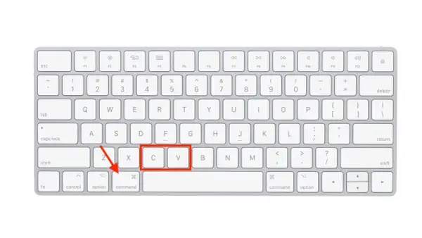 Teclado de Mac con las teclas Comando, X, C y V resaltadas, indicando la combinación para copiar.