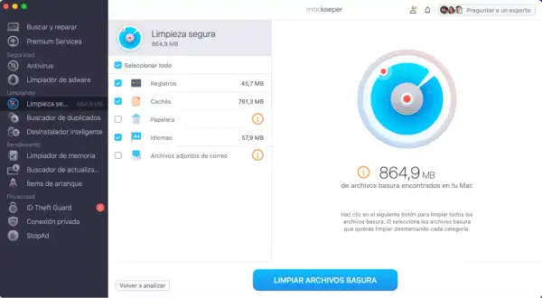 Interfaz de MacKeeper mostrando cómo limpiar el Mac de archivos basura. Se listan categorías como Cachés y Papelera, con un total de 864,9 MB.